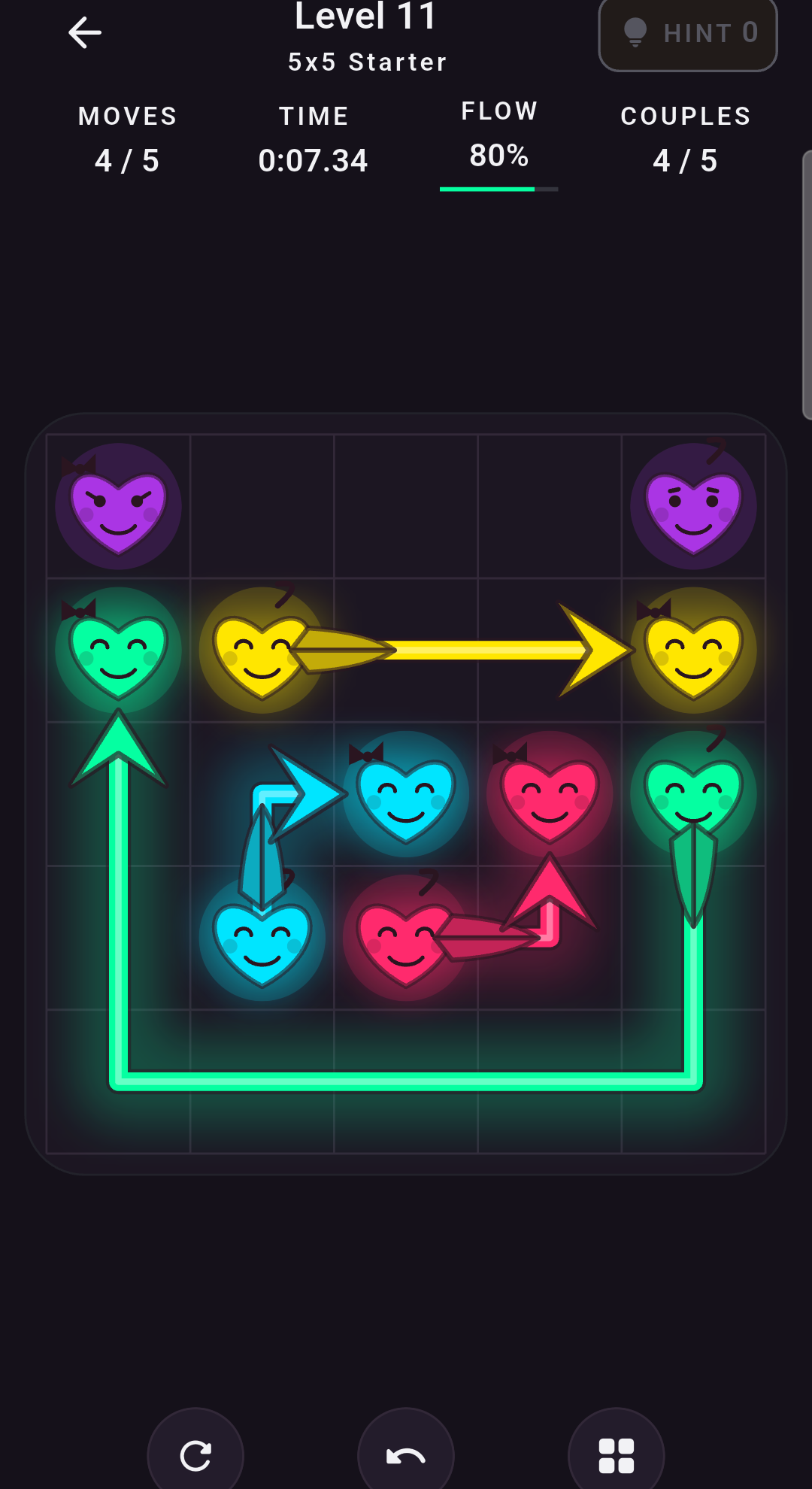 Real Arrowheart gameplay showing colorful paths joining matching hearts on a five by five board